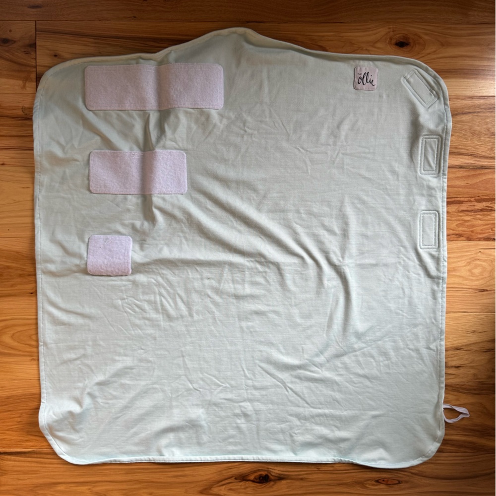 Turquoise Ollie swaddle wrap like new